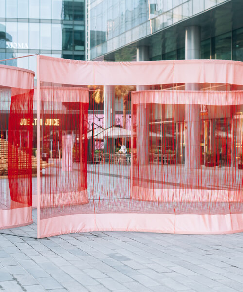 palestinian artist areen's flowing installation unravels waves of threads at dubai design week