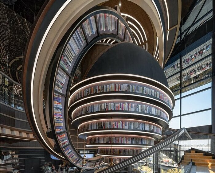 colossal celestial rings enliven x+living's futuristic bookstore in jiangsu, china