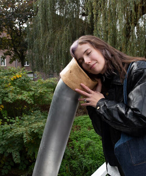 sound pipes and glass bulbs let eindhoven's dommel river communicate with passersby