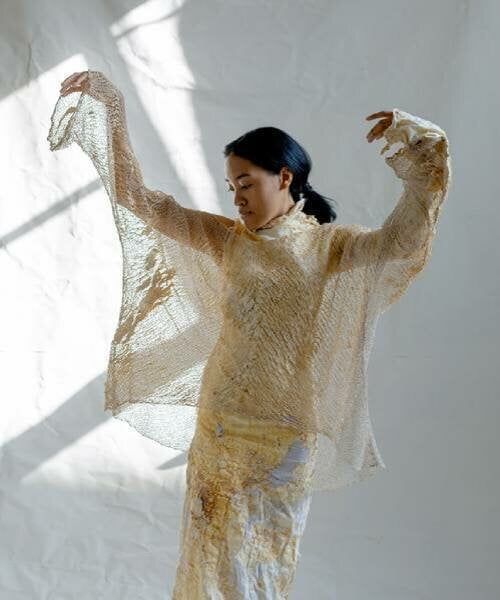 dasha tsapenko grows her biodegradable wedding dress from mycelium and vintage ukrainian lace