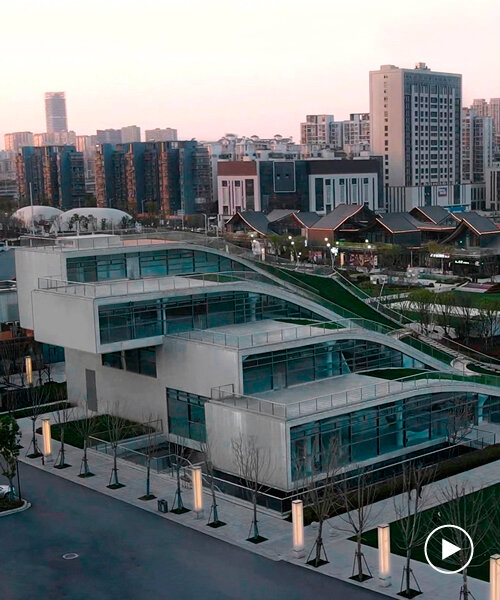 undulated hill-like planted steps merge contemporary art center in china with urban fabric