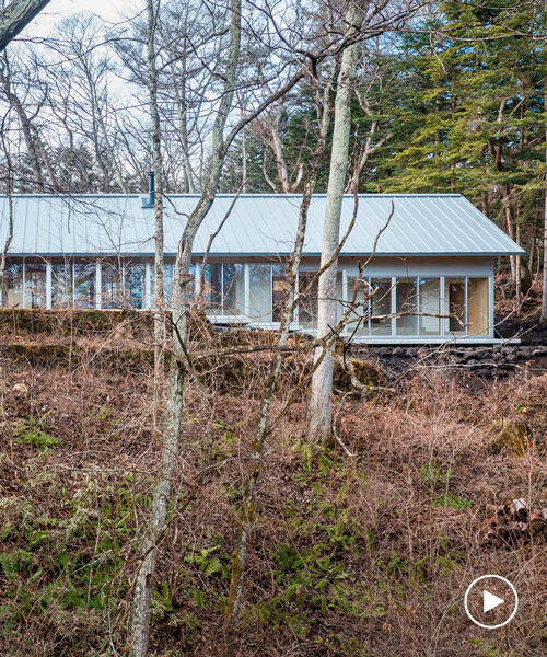 takahiro endo architects office crafts a double gable roof for forest villa in japan